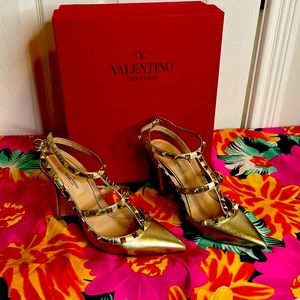 Gold rock studded Valentinos w/ ankle strap. Extra studs inside box. Size 38.